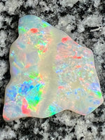 Load image into Gallery viewer, 51,36 ct multi patern red fire everywhere bigg opal
