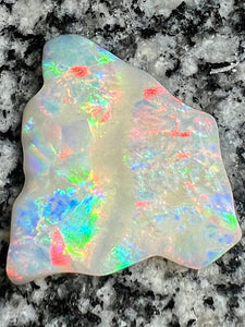 51,36 ct multi patern red fire everywhere bigg opal