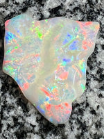 Load image into Gallery viewer, 51,36 ct multi patern red fire everywhere bigg opal
