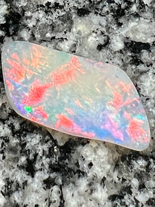 12,76 ct red fire everywhere bigg opal