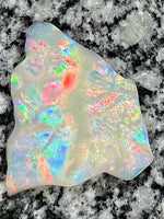 Load image into Gallery viewer, 51,36 ct multi patern red fire everywhere bigg opal
