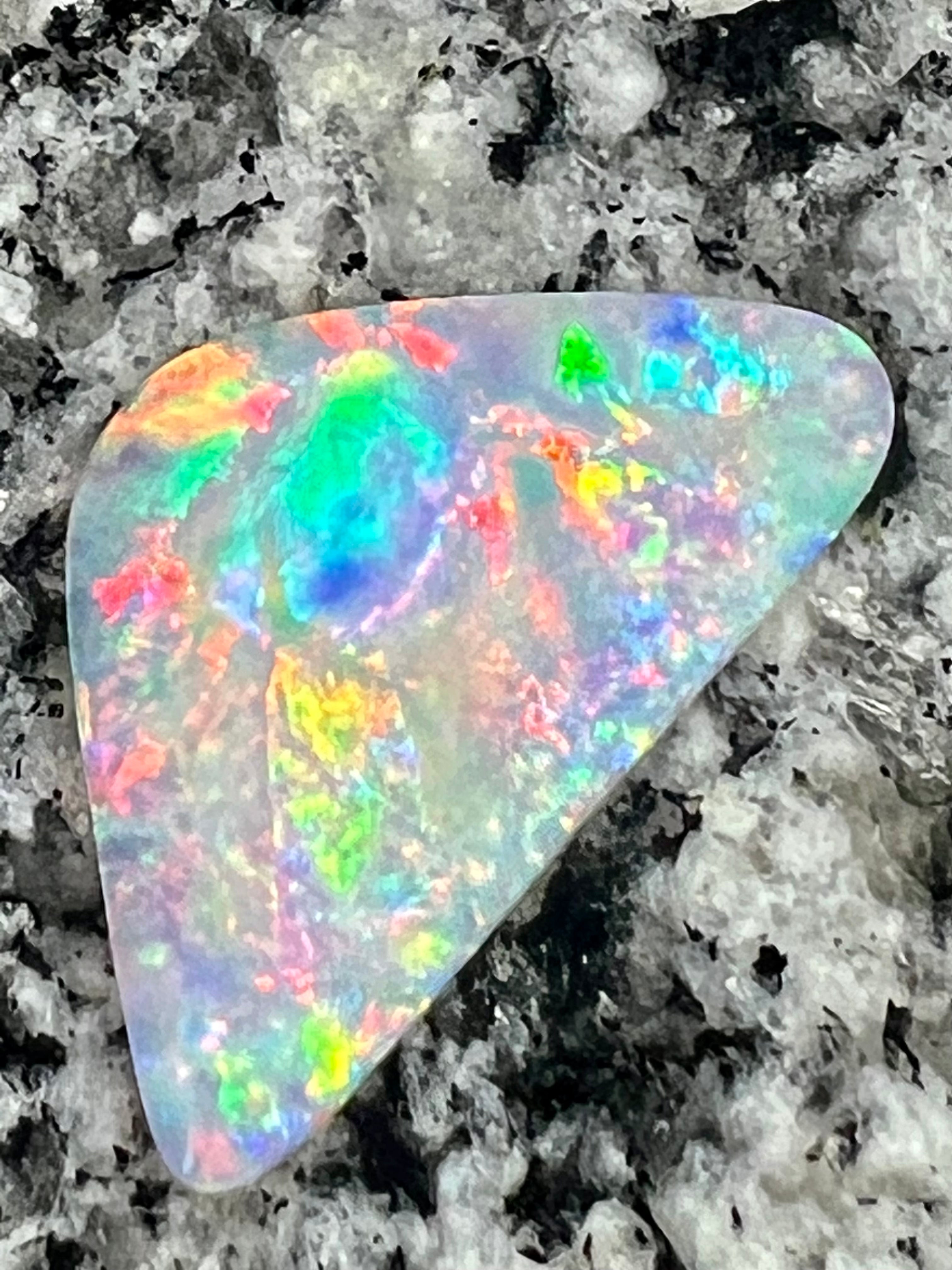 8,19ct rolling rainbow flashfire 2 sided opal