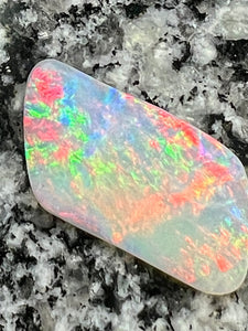 12,76 ct red fire everywhere bigg opal