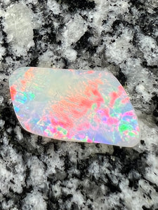 12,76 ct red fire everywhere bigg opal