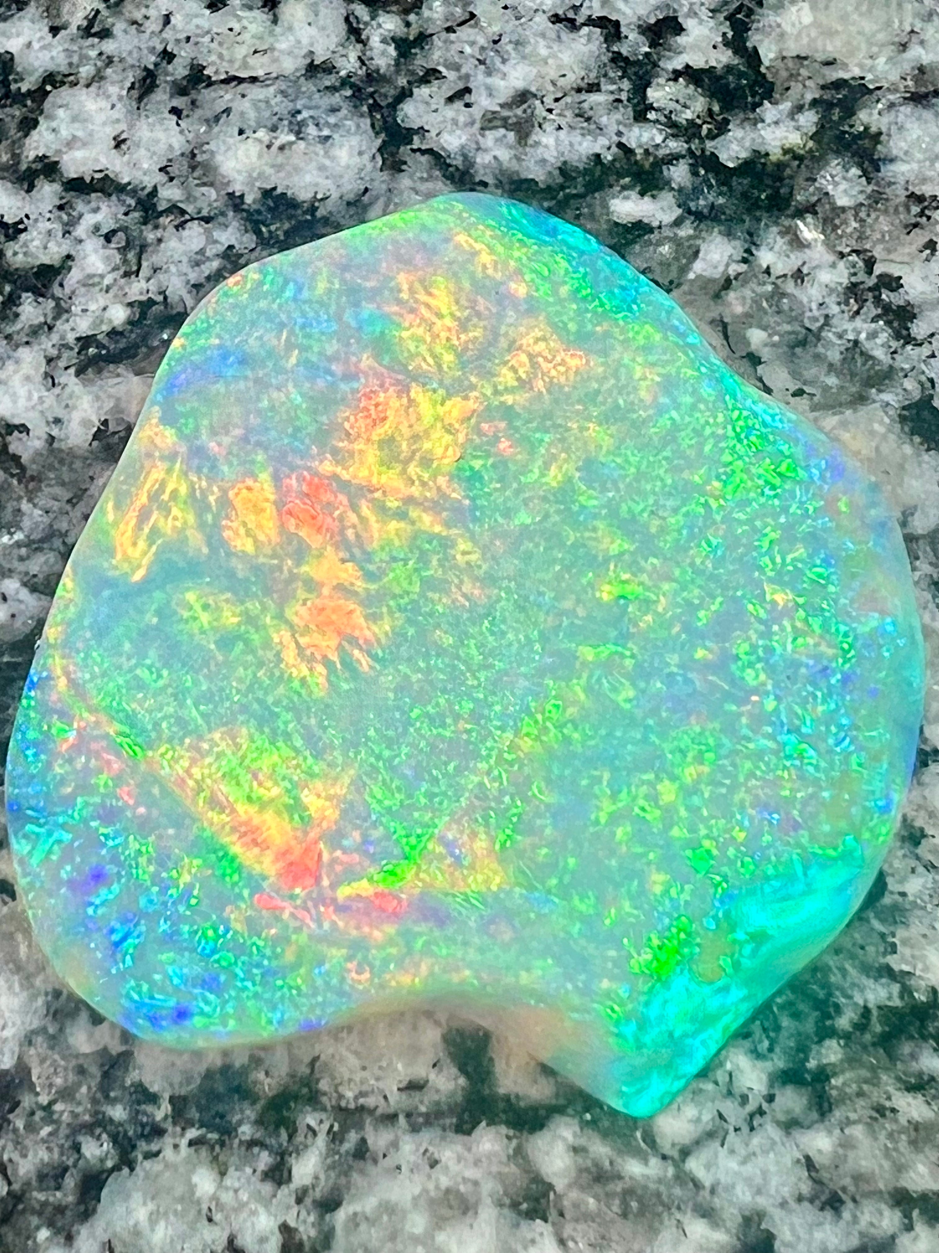 72,85 ct bigg 2- sided crystal opal only color on both sides