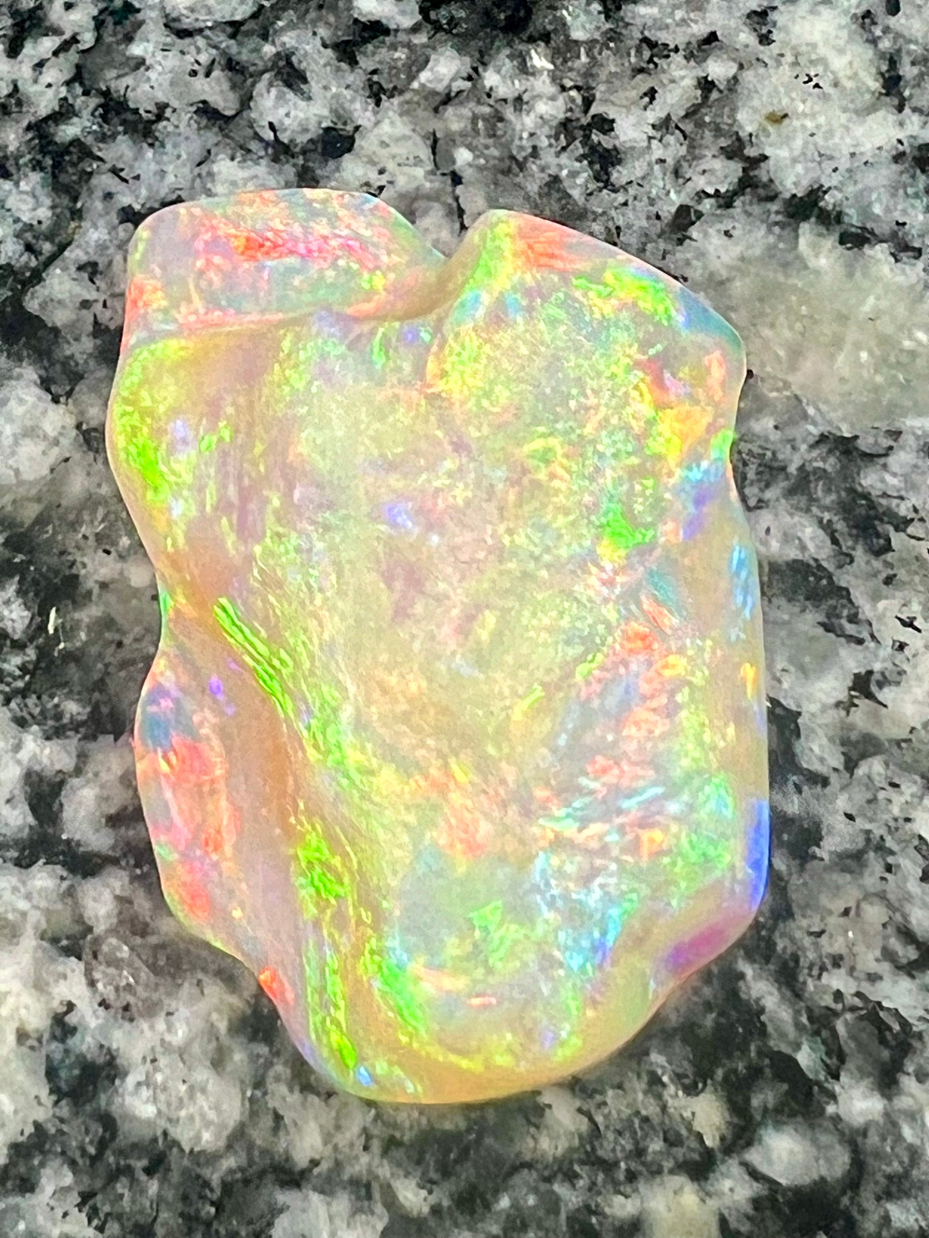 64,6 ct bigg 2- sided fully saturated multi patern rainbow colors opal