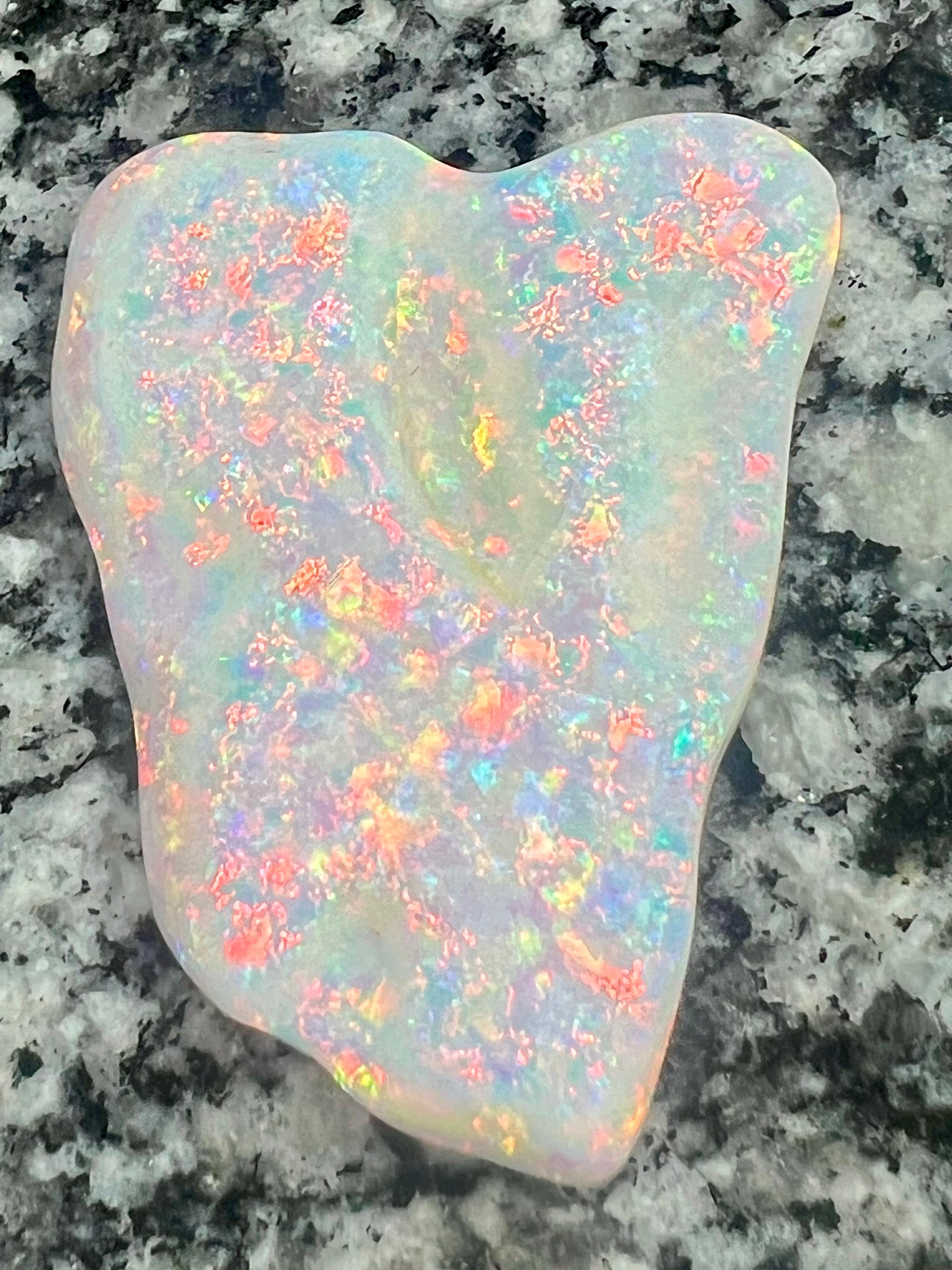 96,9ct fully saturated red fire everywhere braIlian opal