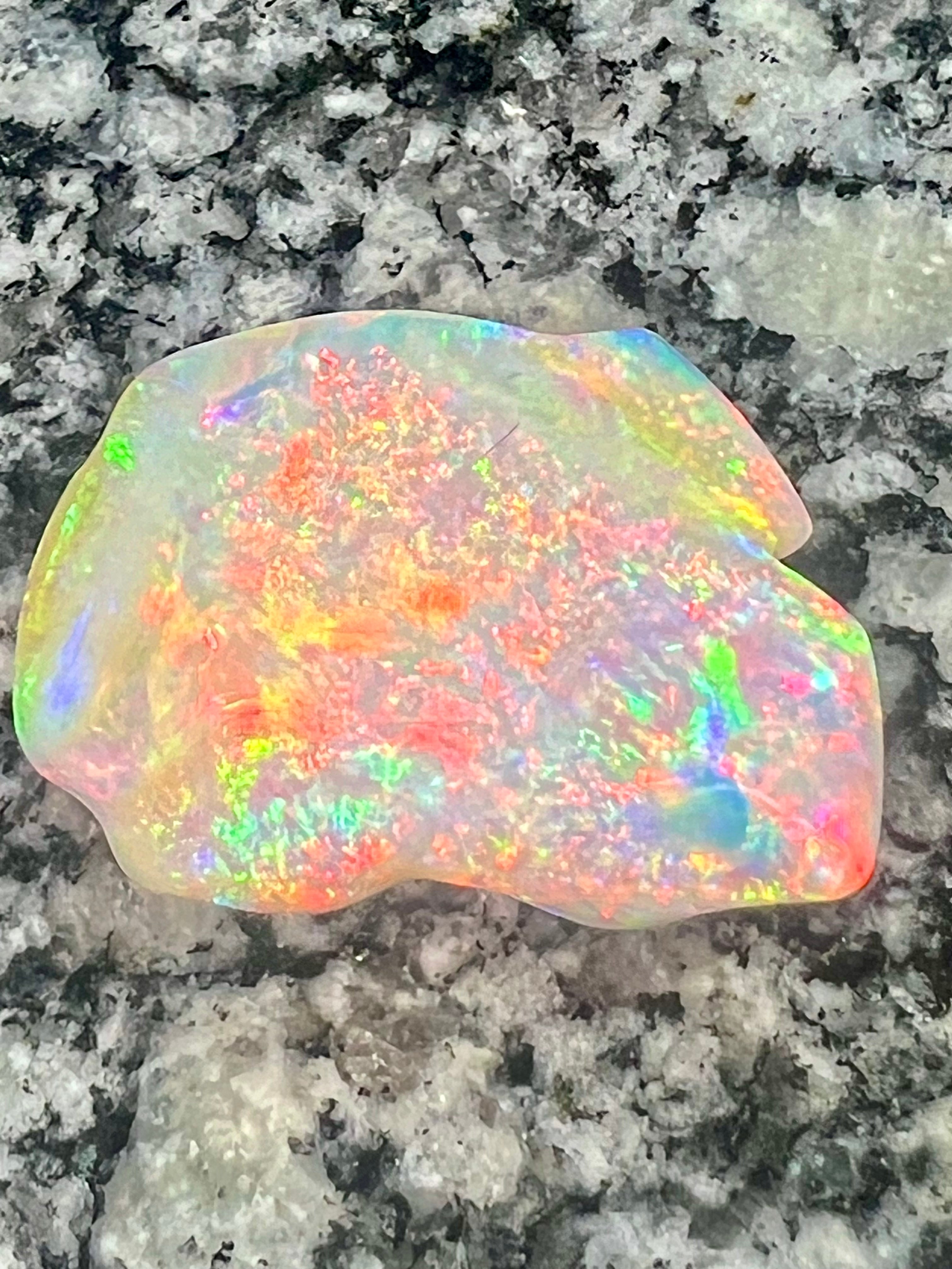 64,6 ct bigg 2- sided fully saturated multi patern rainbow colors opal