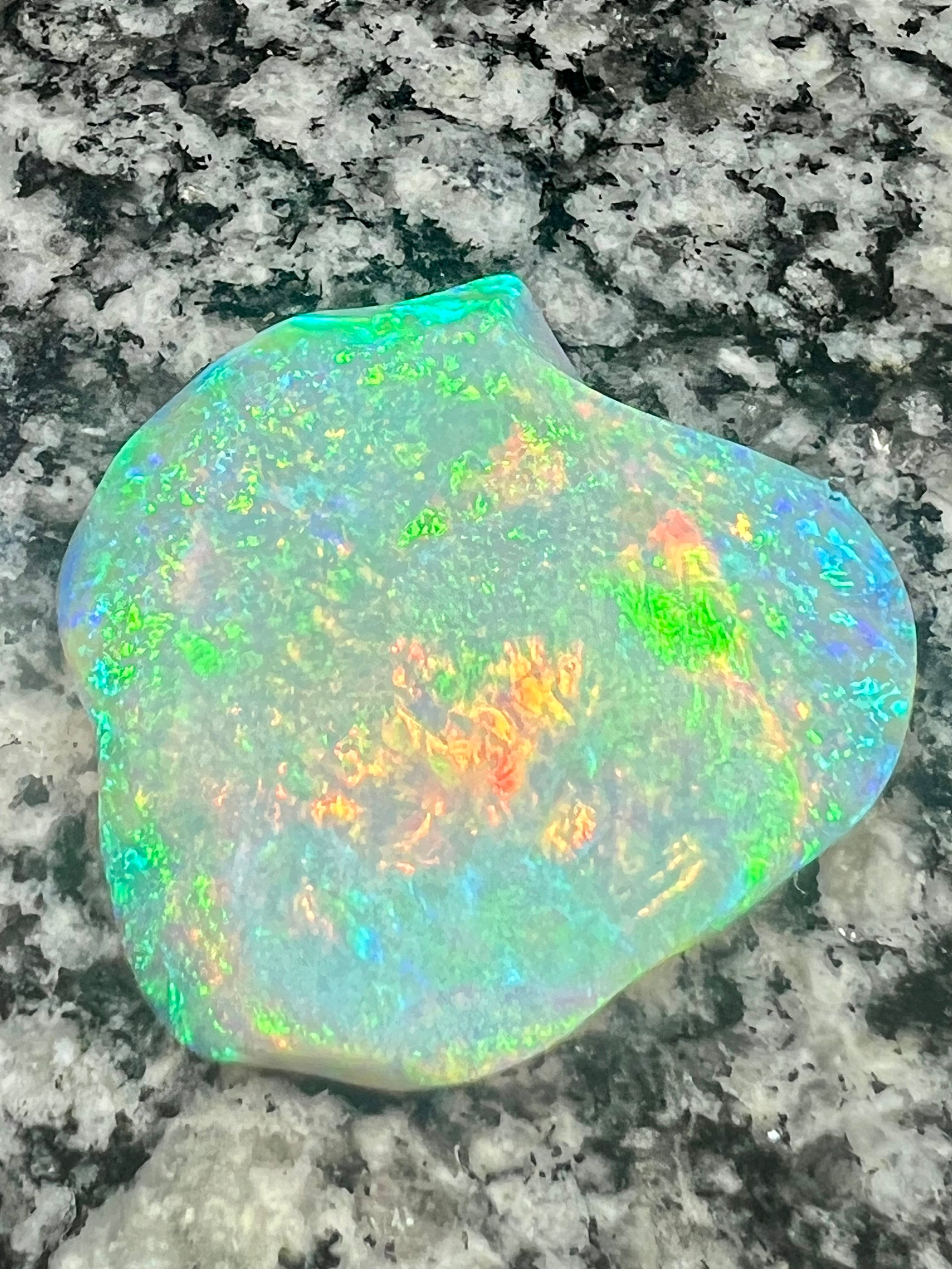 72,85 ct bigg 2- sided crystal opal only color on both sides