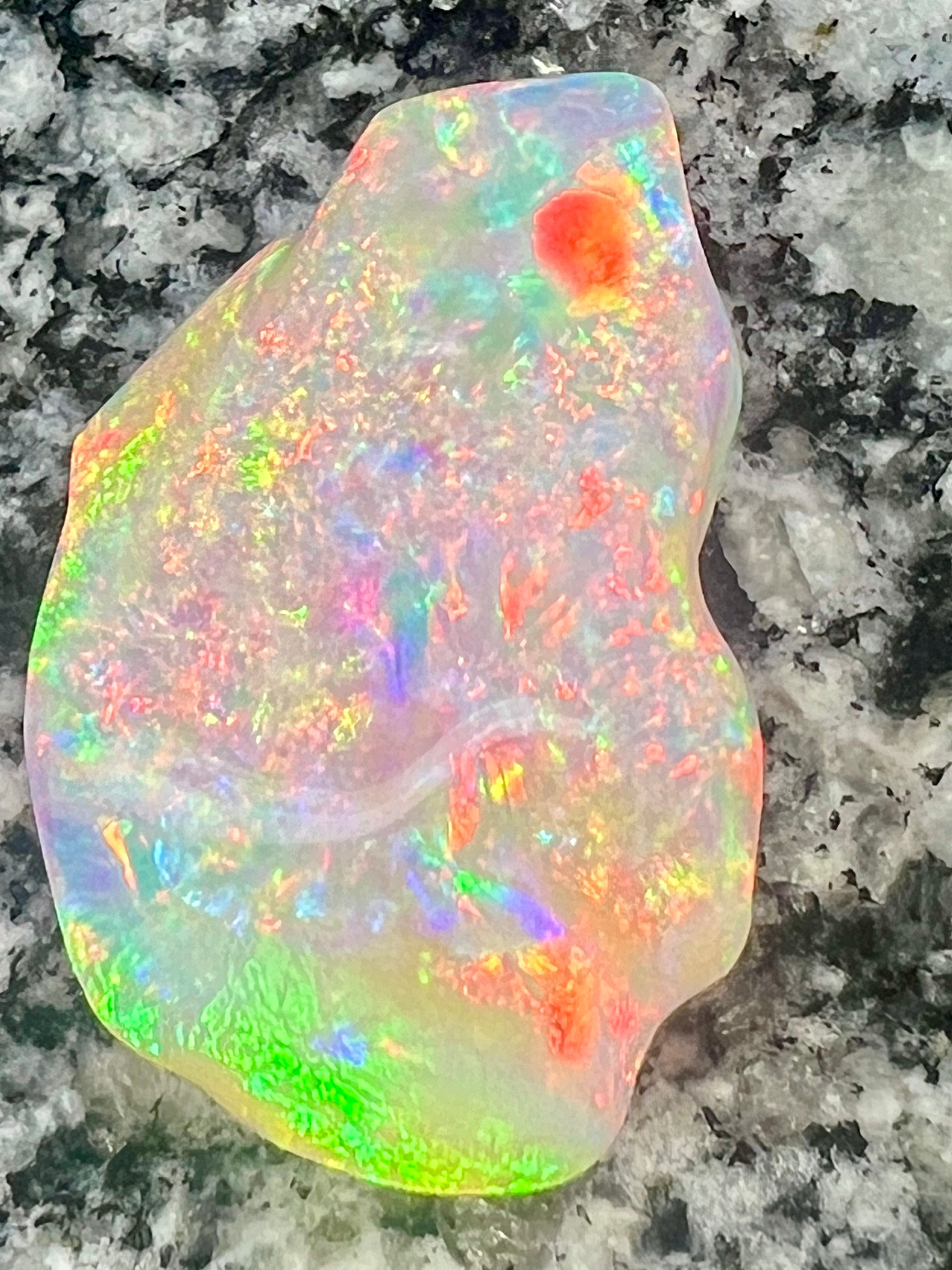 64,6 ct bigg 2- sided fully saturated multi patern rainbow colors opal