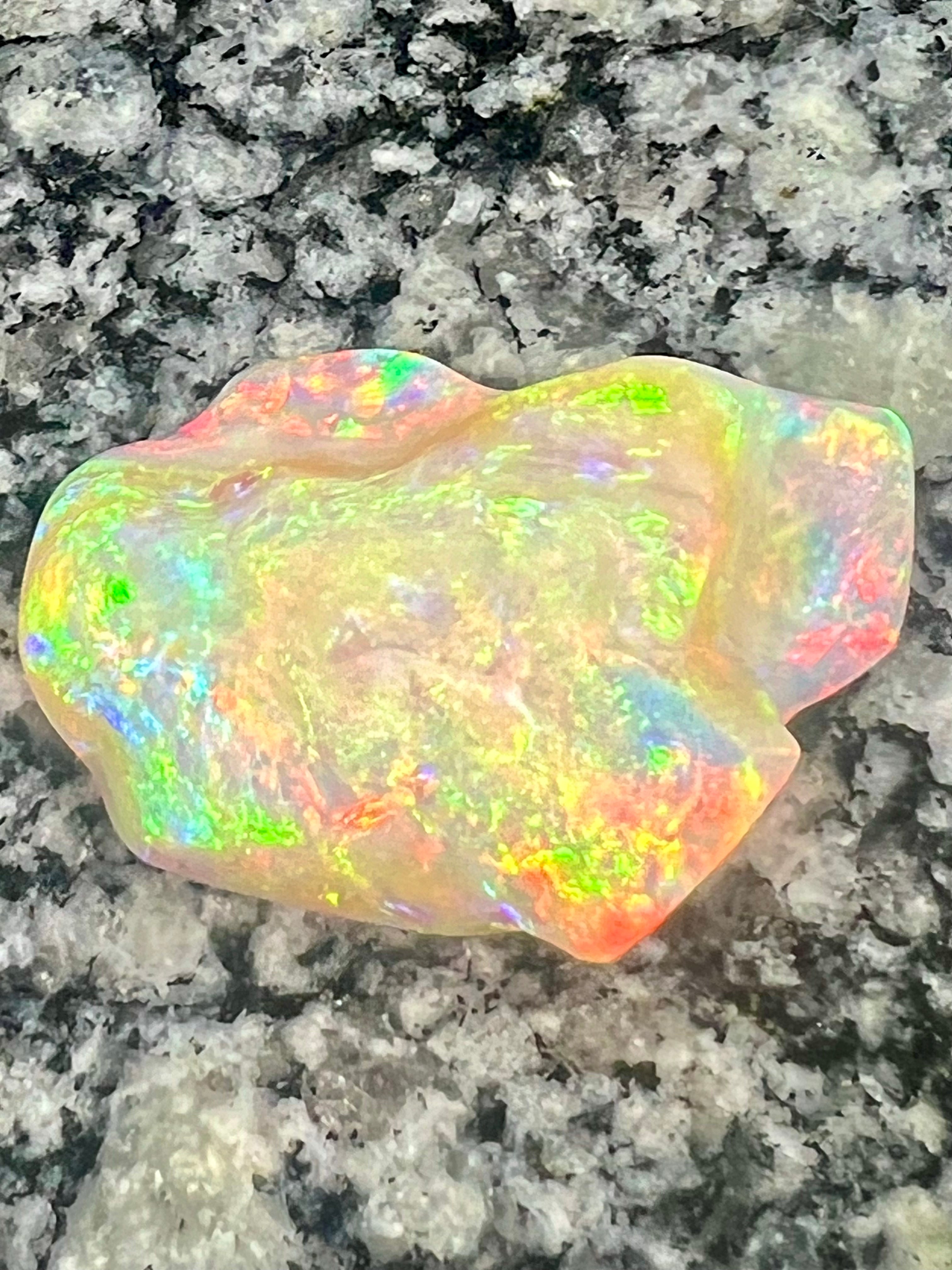 64,6 ct bigg 2- sided fully saturated multi patern rainbow colors opal