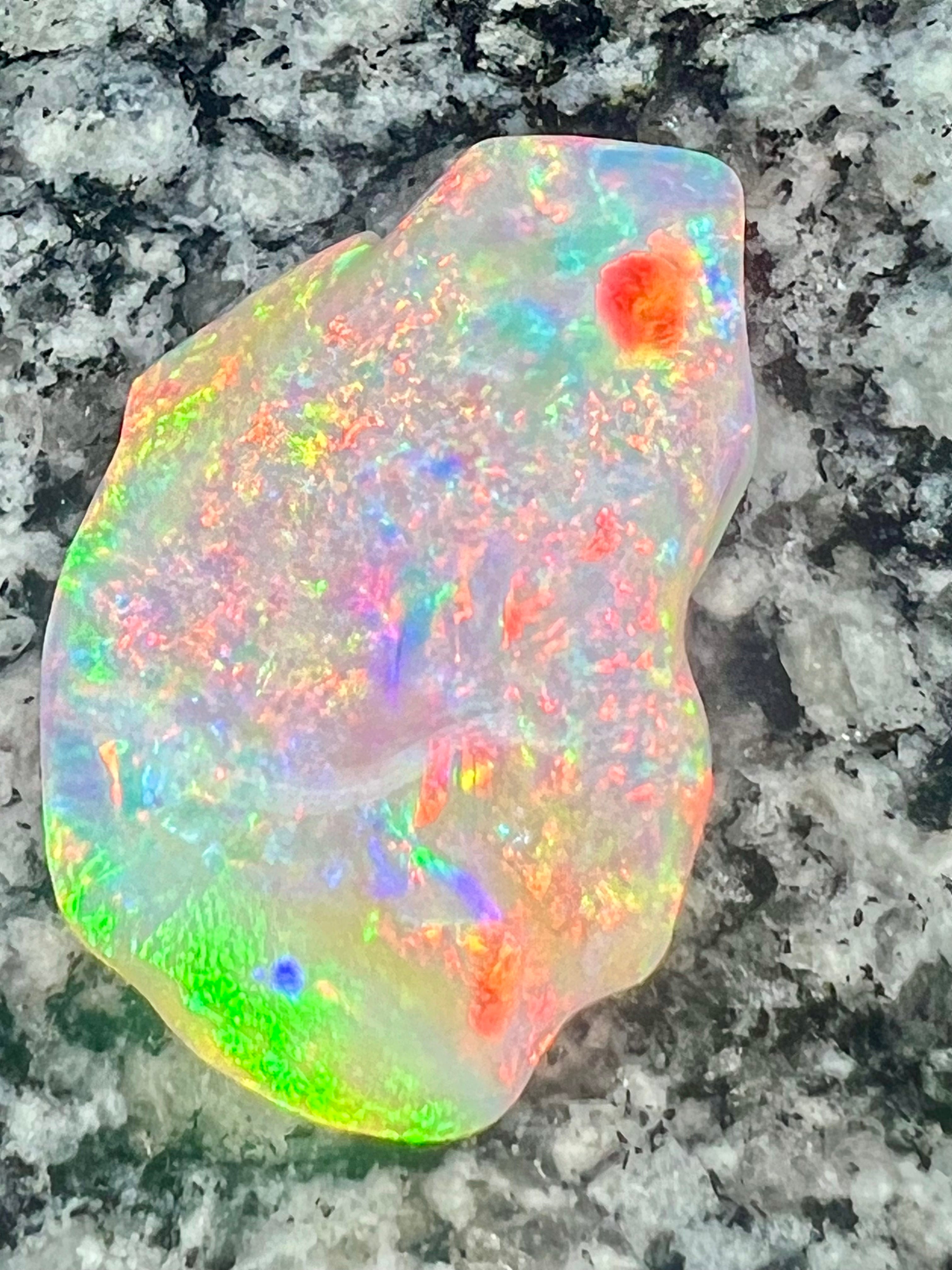 64,6 ct bigg 2- sided fully saturated multi patern rainbow colors opal