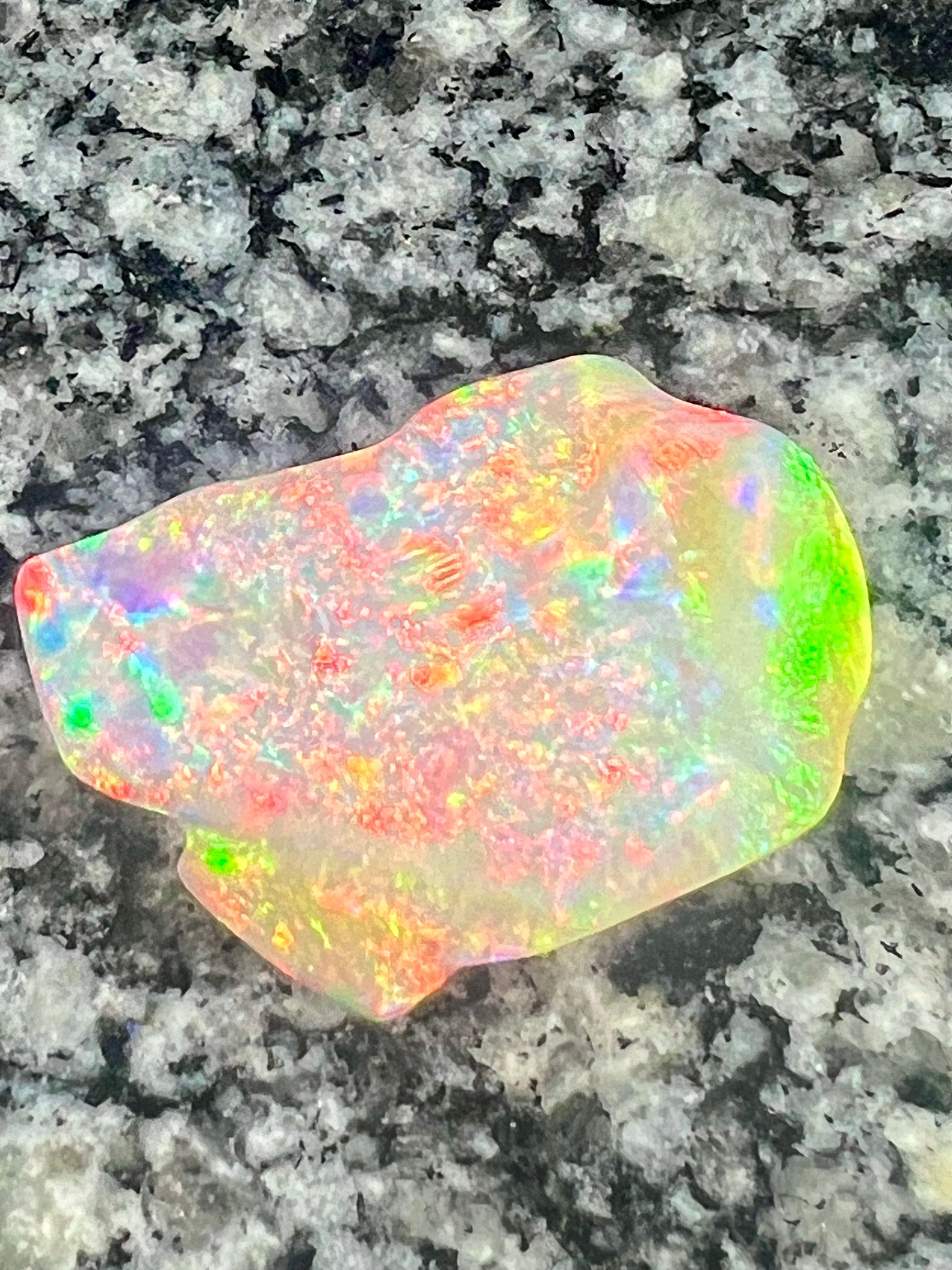 64,6 ct bigg 2- sided fully saturated multi patern rainbow colors opal