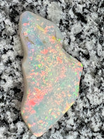 Load image into Gallery viewer, Sold. 67,3 ct this opal is on fire red everywhere
