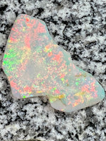 Load image into Gallery viewer, Sold. 67,3 ct this opal is on fire red everywhere
