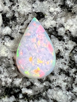 Load image into Gallery viewer, 6,2ct multi patern fully saturated teardrop opal
