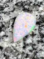 Load image into Gallery viewer, 6,2ct multi patern fully saturated teardrop opal
