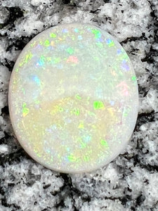 19,73ct  bigg fully saturated multi patern oval opal