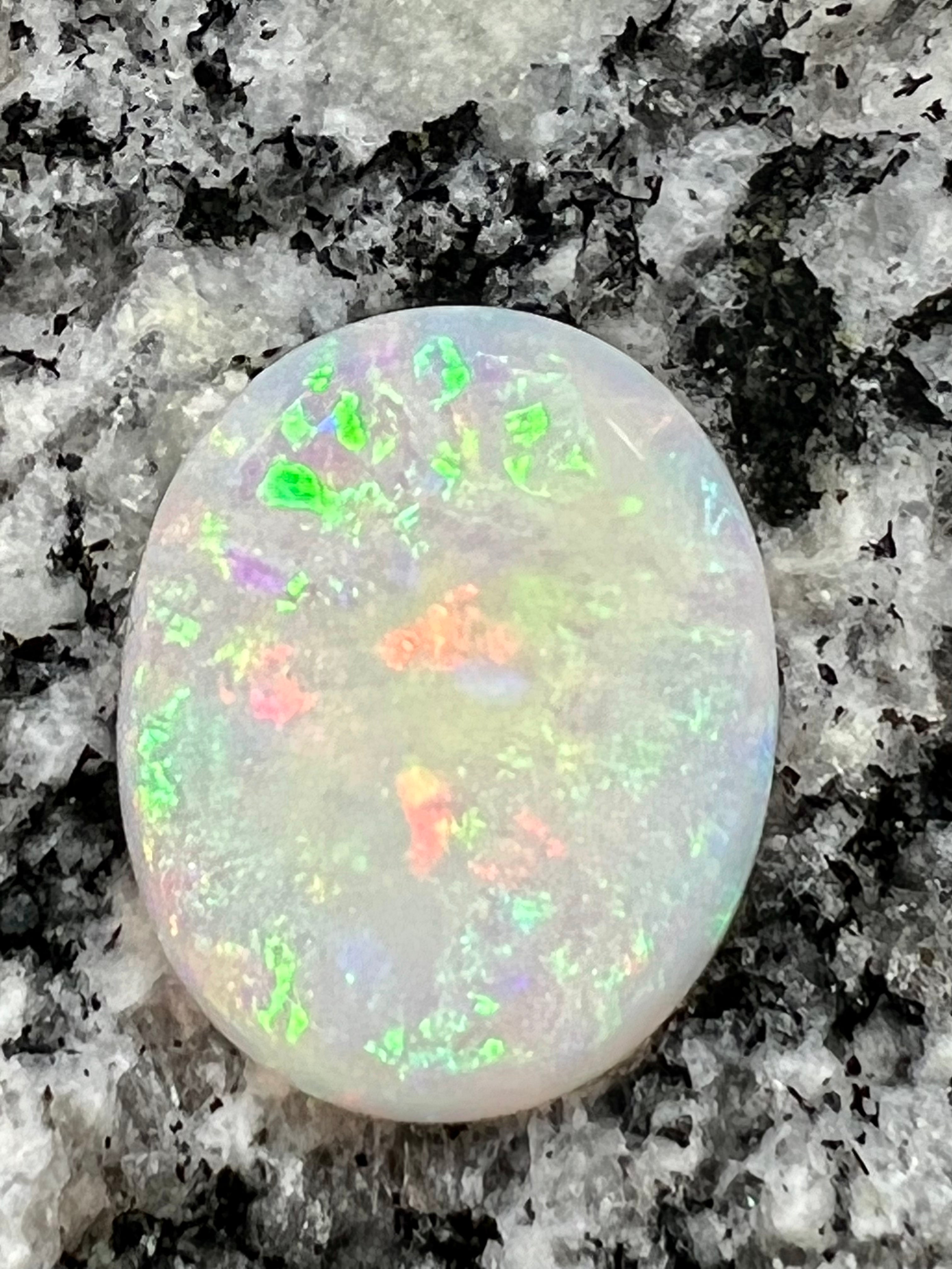 10,97ct multi patern oval opal