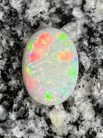 Load image into Gallery viewer, 8,16ct nice patern multi color oval opal
