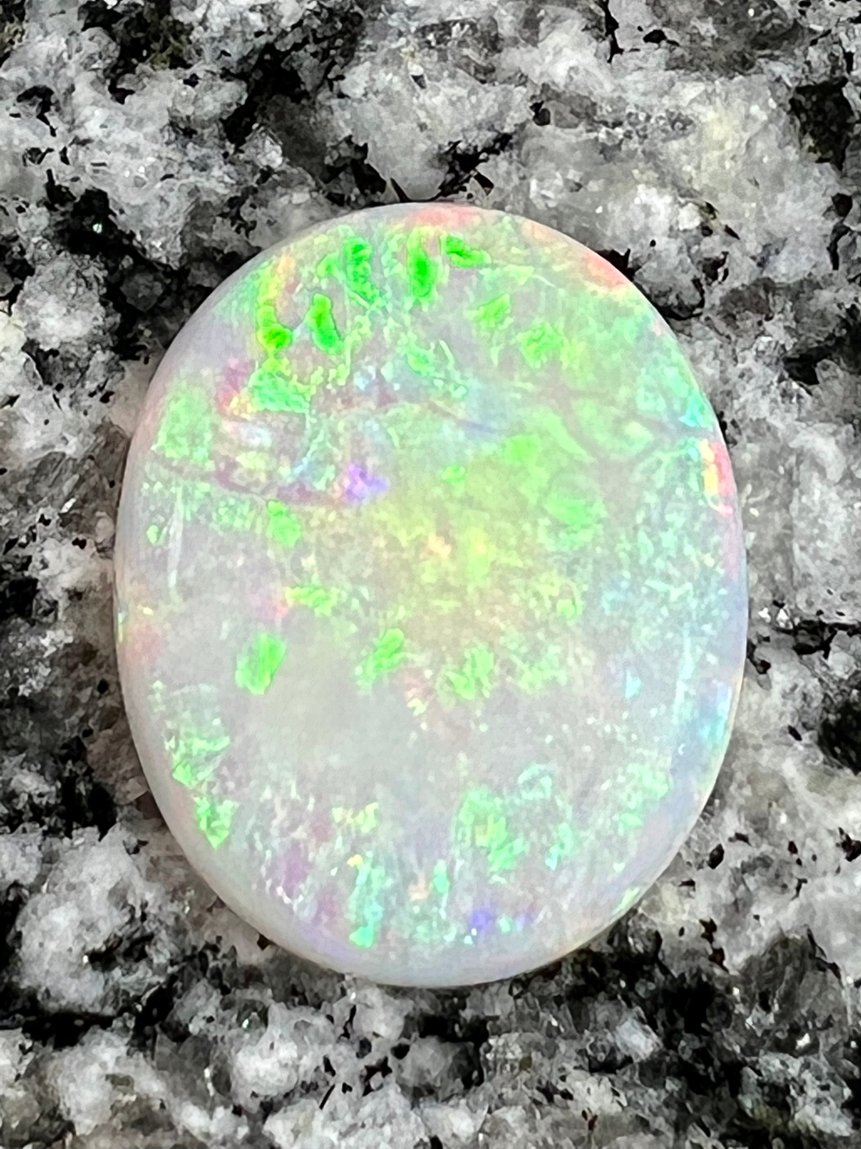 10,97ct multi patern oval opal