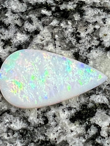 13,8 ct rolling flash fire patern teardrop opal