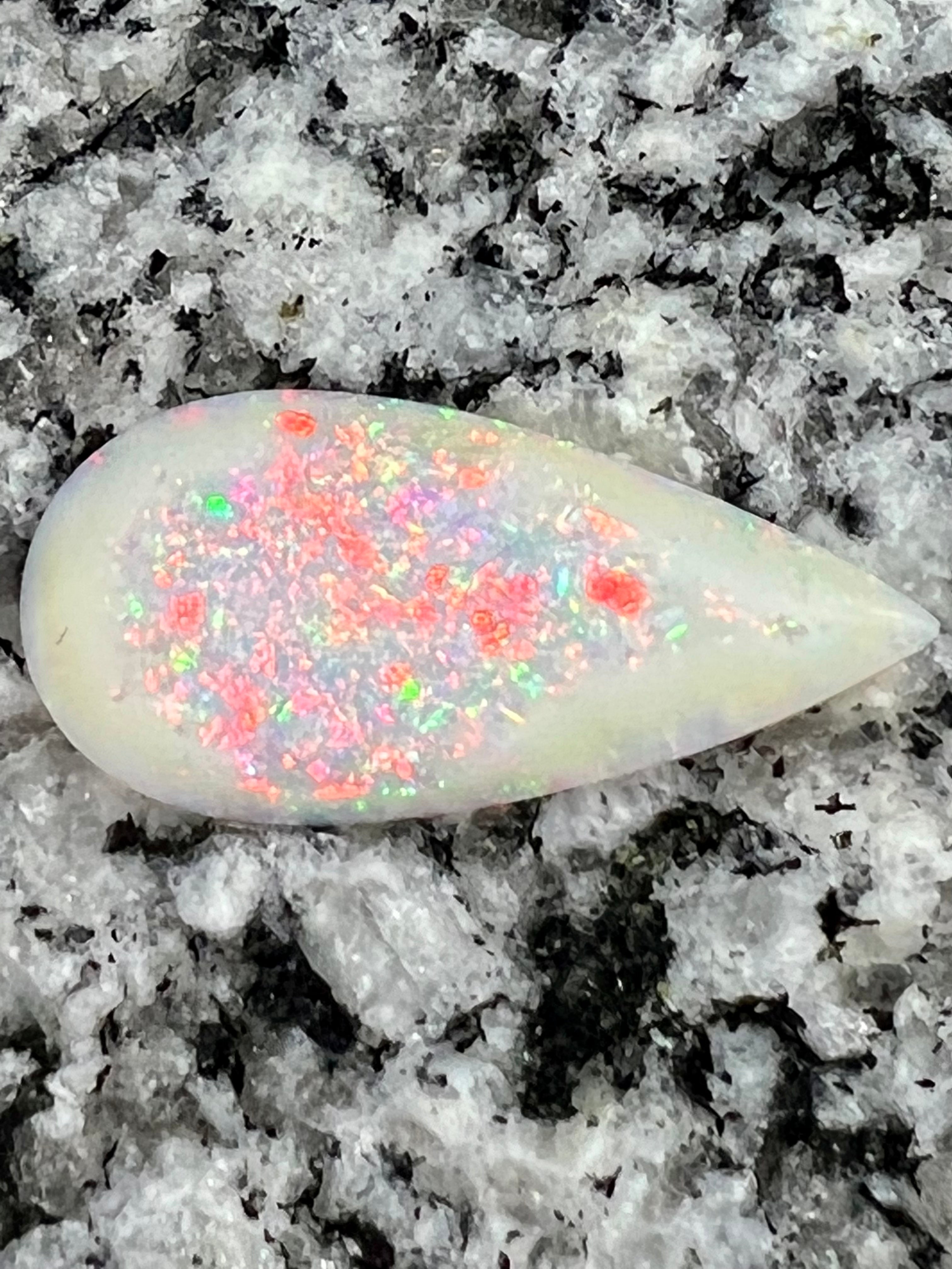 6,52ct  multi colours but lot’s of red fire teardrop opal