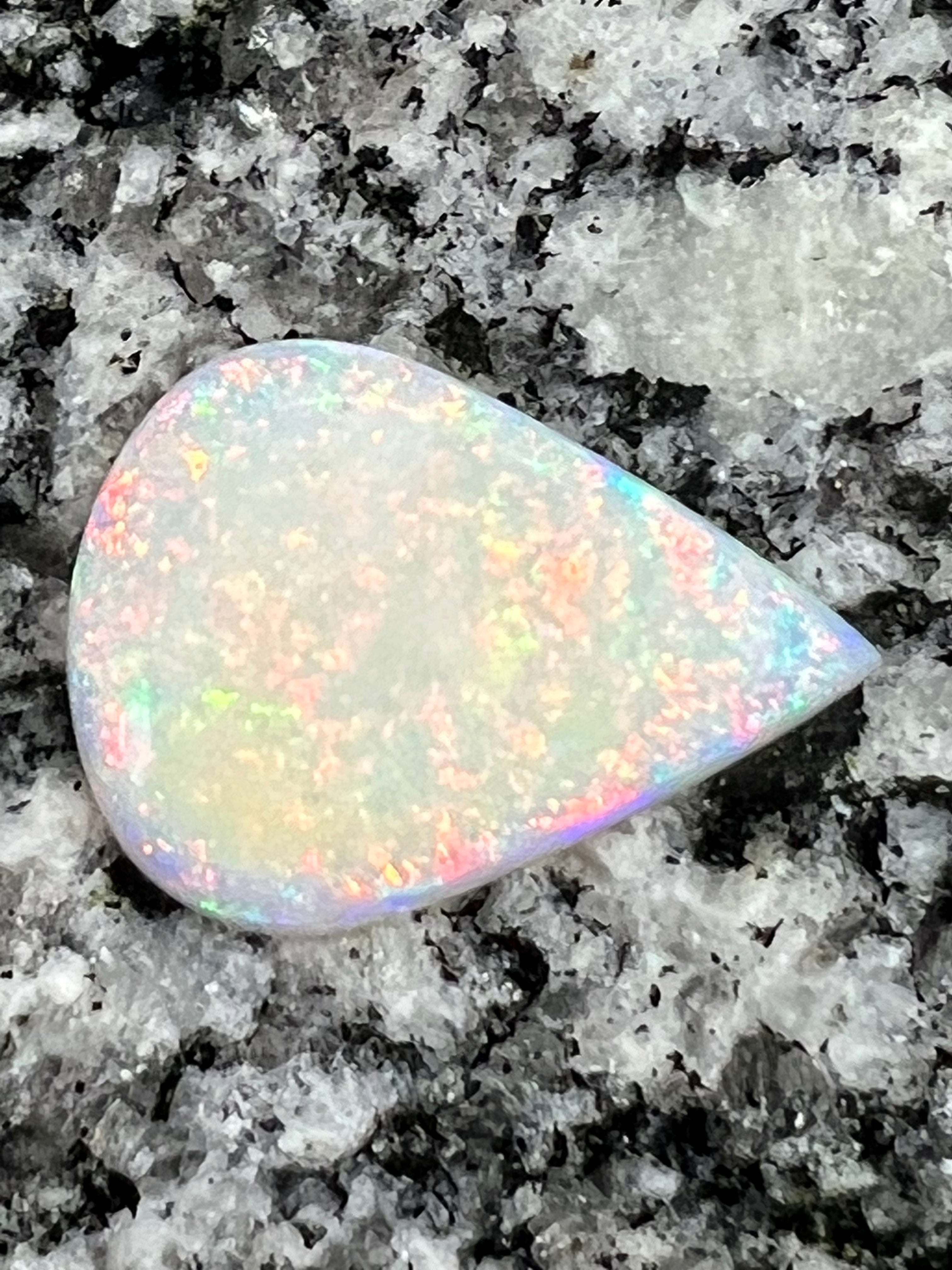 9,8 ct multi patern teardrop opal