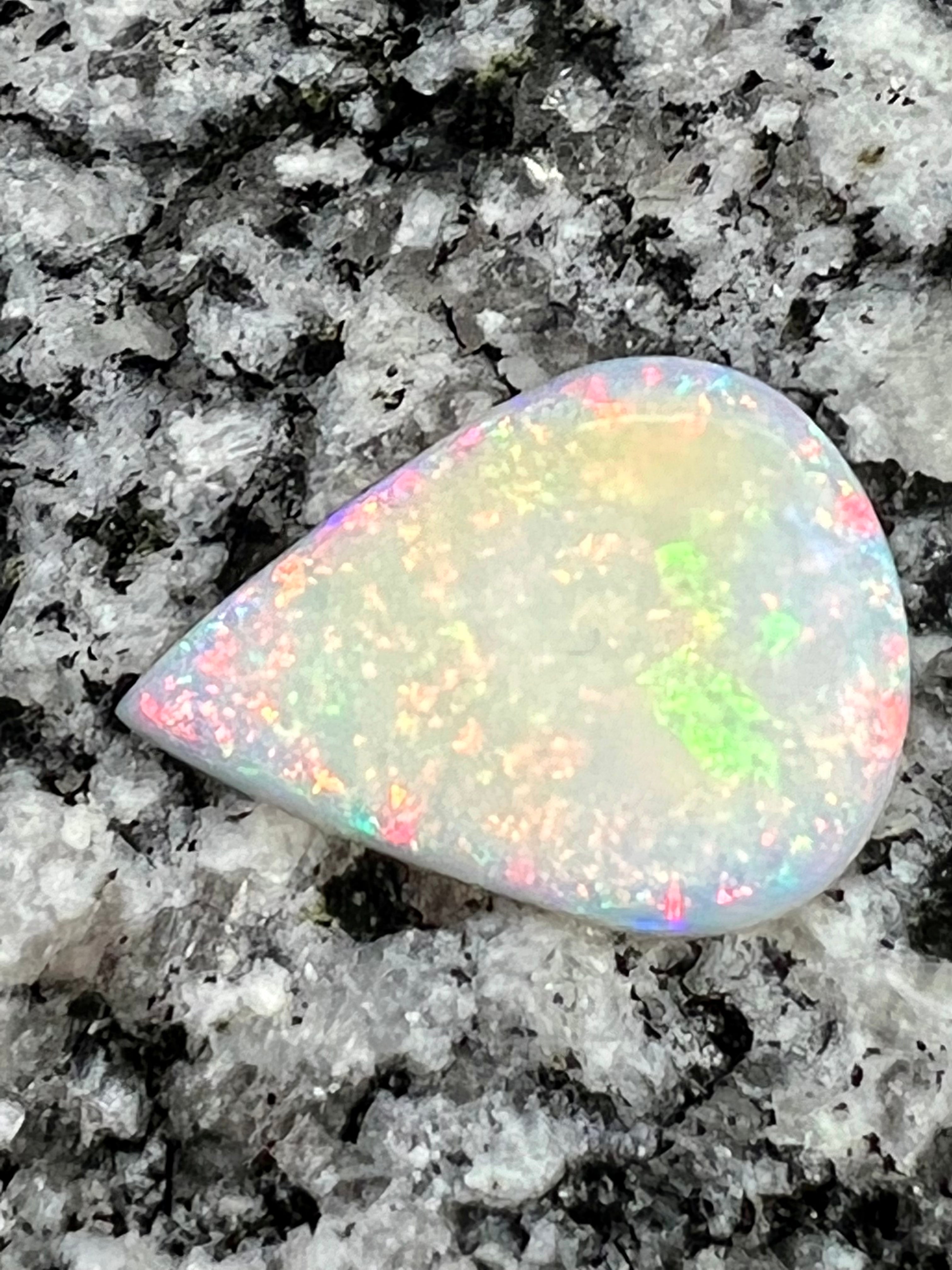 9,8 ct multi patern teardrop opal