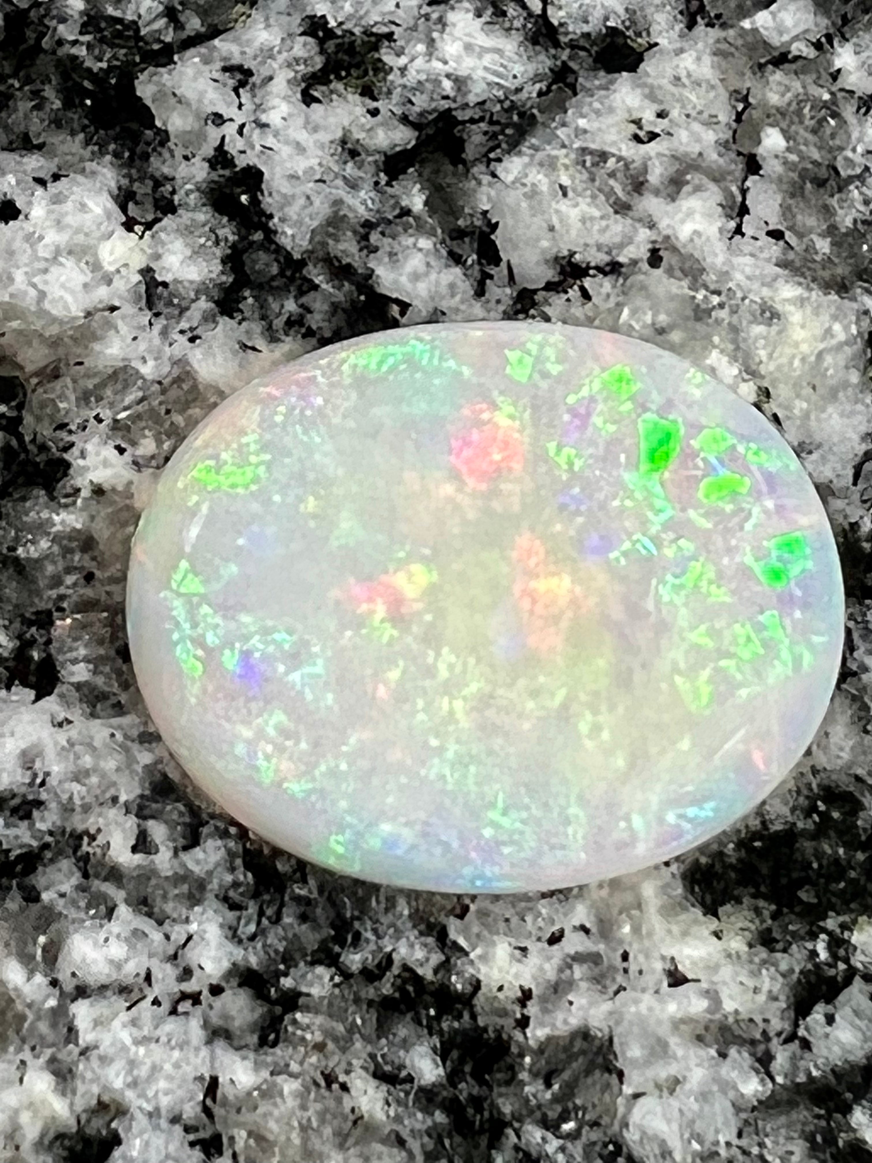 10,97ct multi patern oval opal