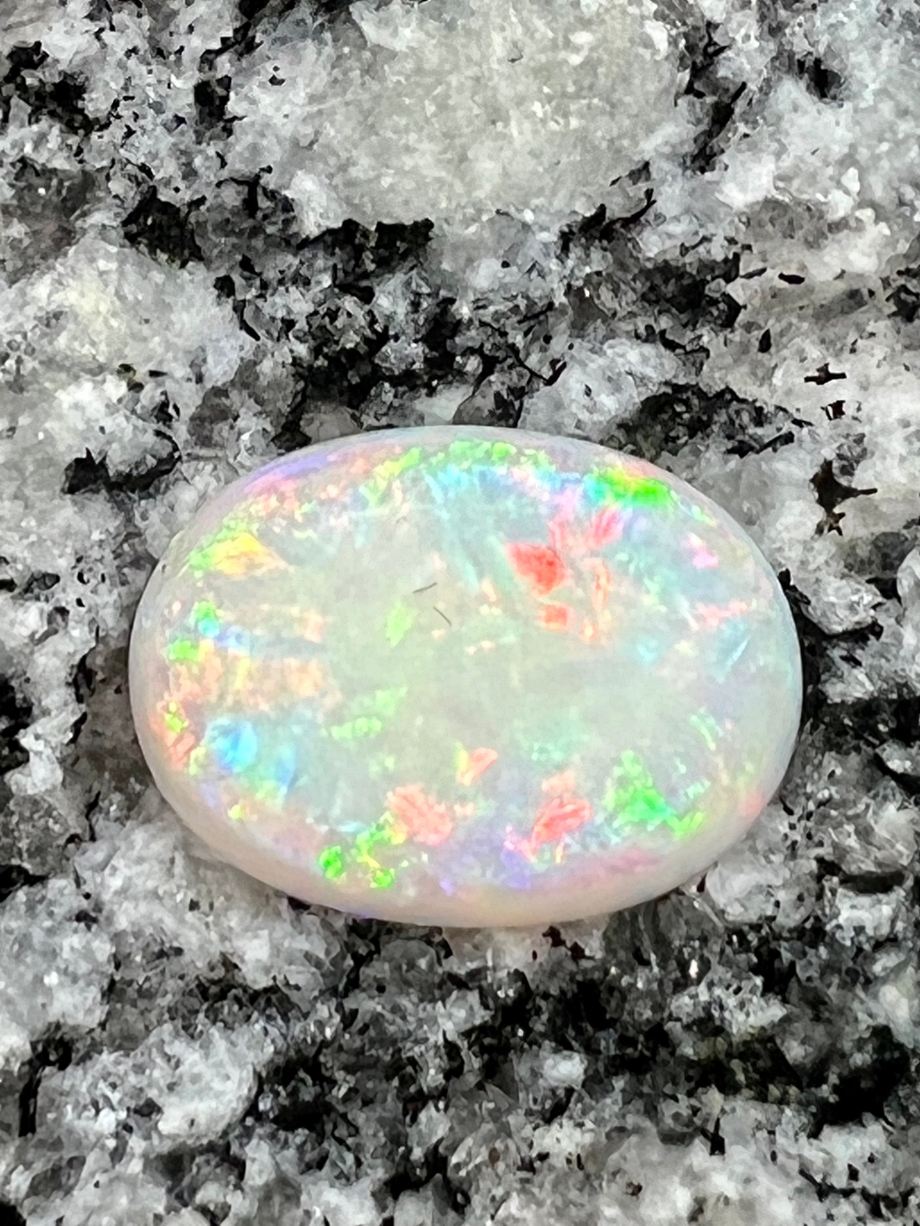 8,16ct nice patern multi color oval opal