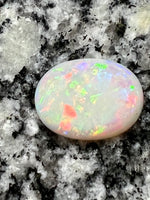 Load image into Gallery viewer, 8,16ct nice patern multi color oval opal
