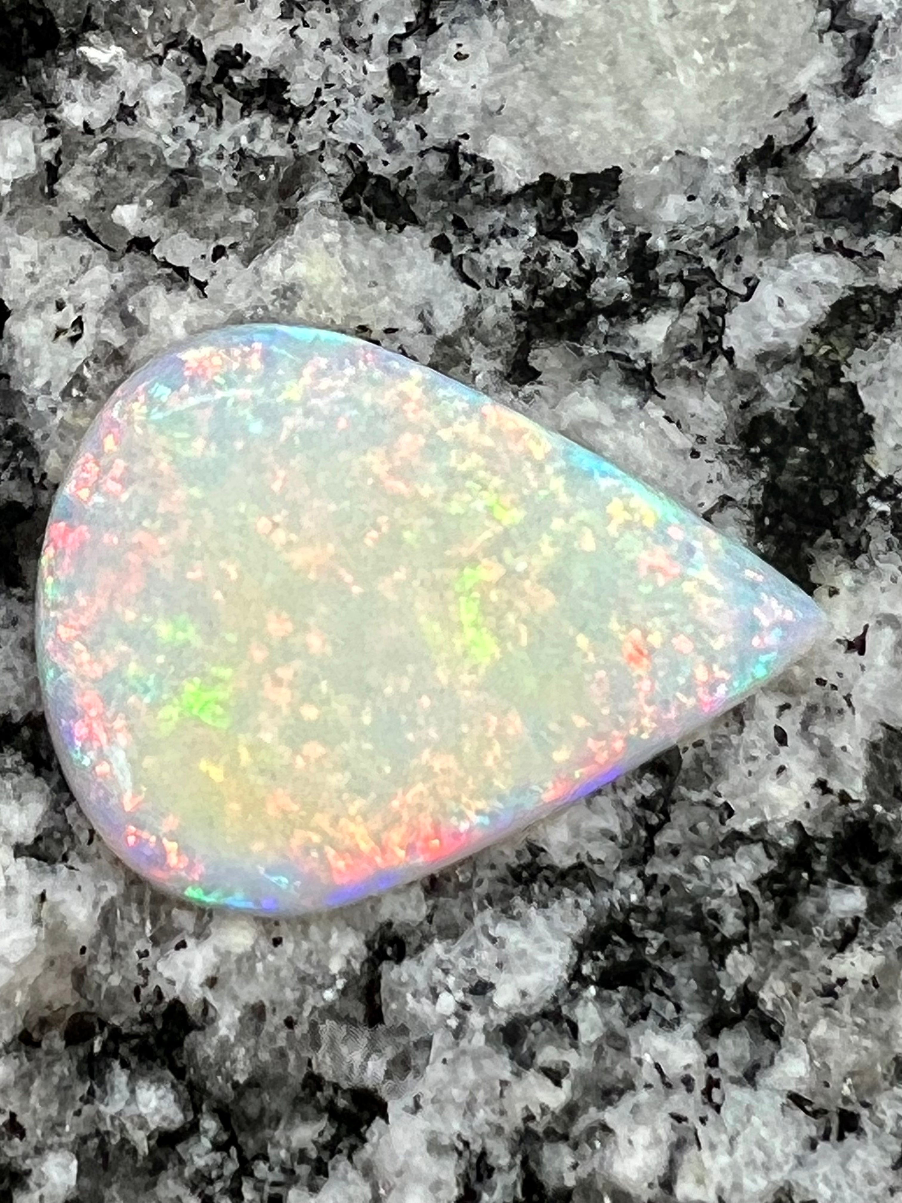 9,8 ct multi patern teardrop opal