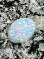 Load image into Gallery viewer, 7,4 ct fully saturated multi colour’s oval opal
