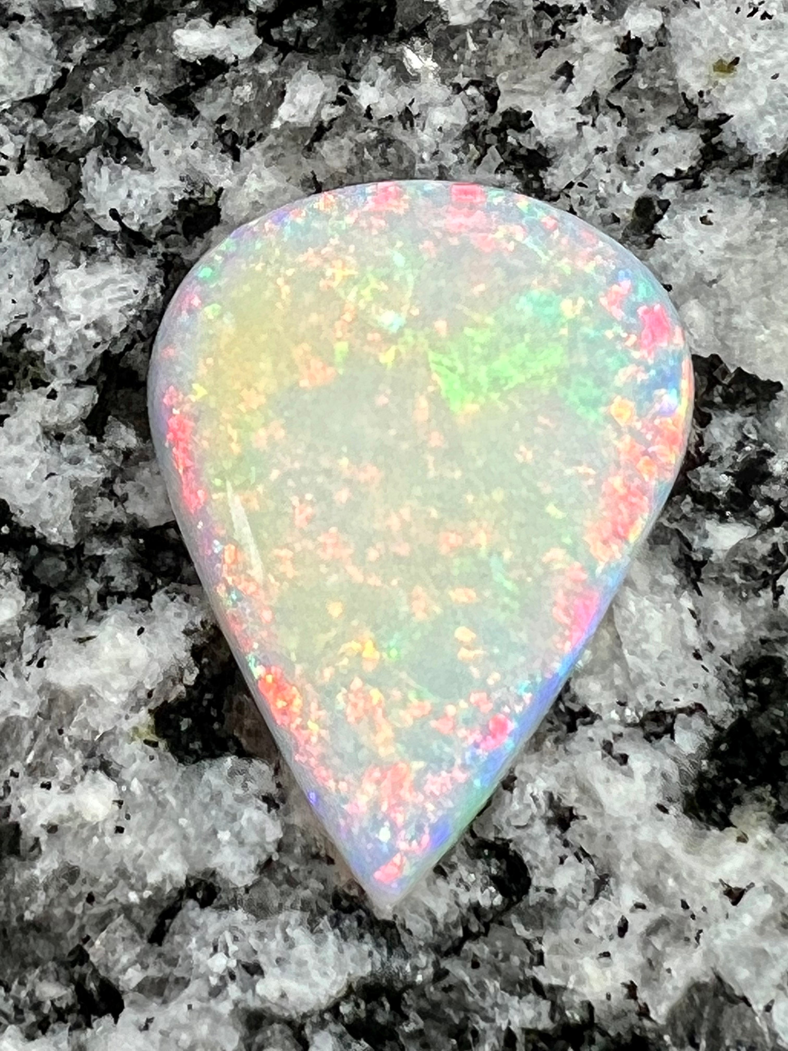 9,8 ct multi patern teardrop opal