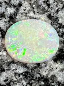 10,97ct multi patern oval opal