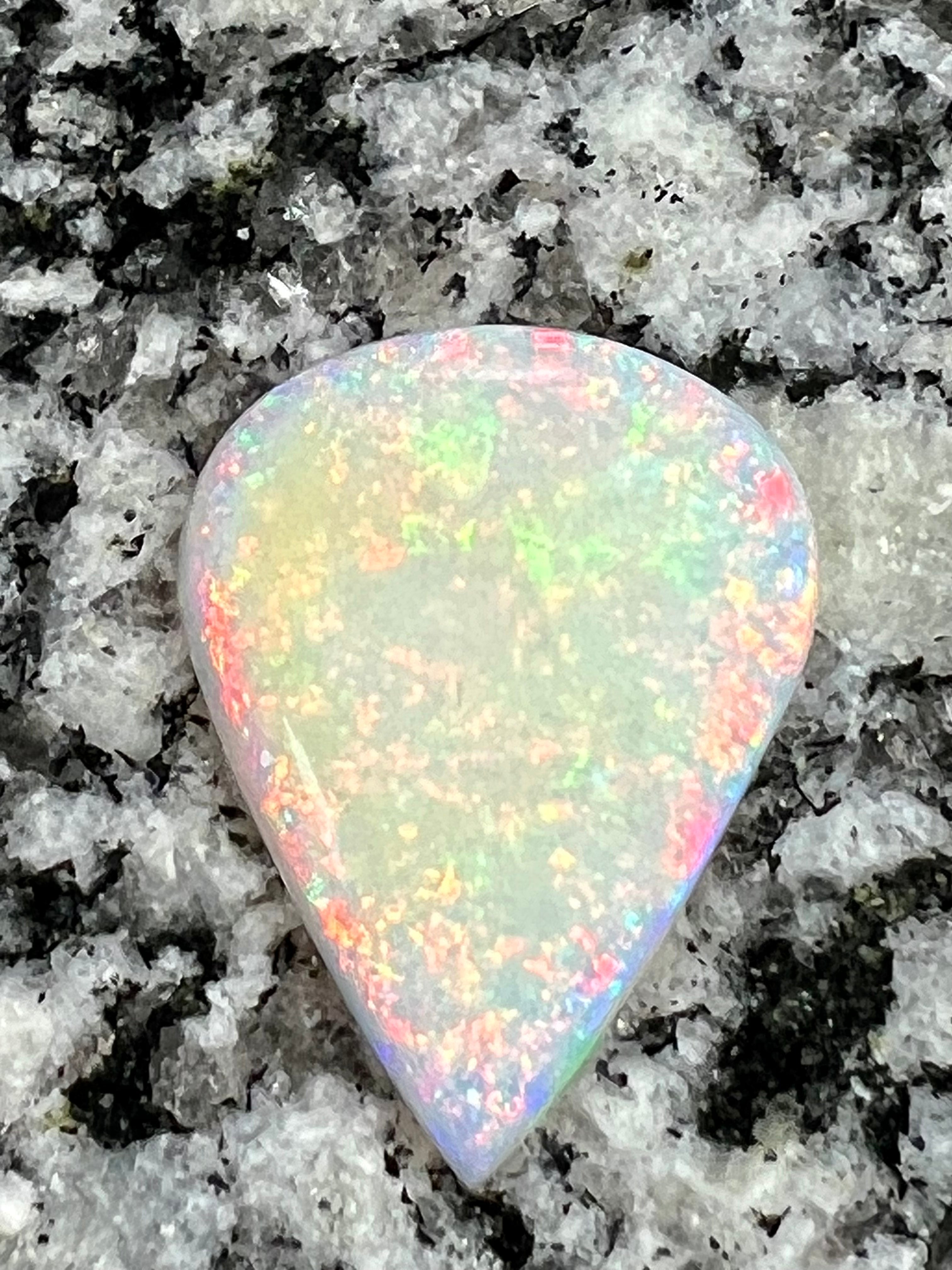 9,8 ct multi patern teardrop opal